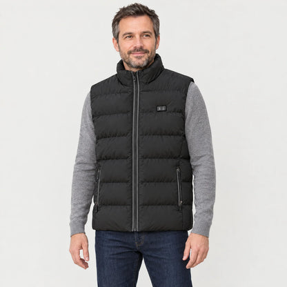 Man wearing the heated vest 2.0 over a grey knit sweater